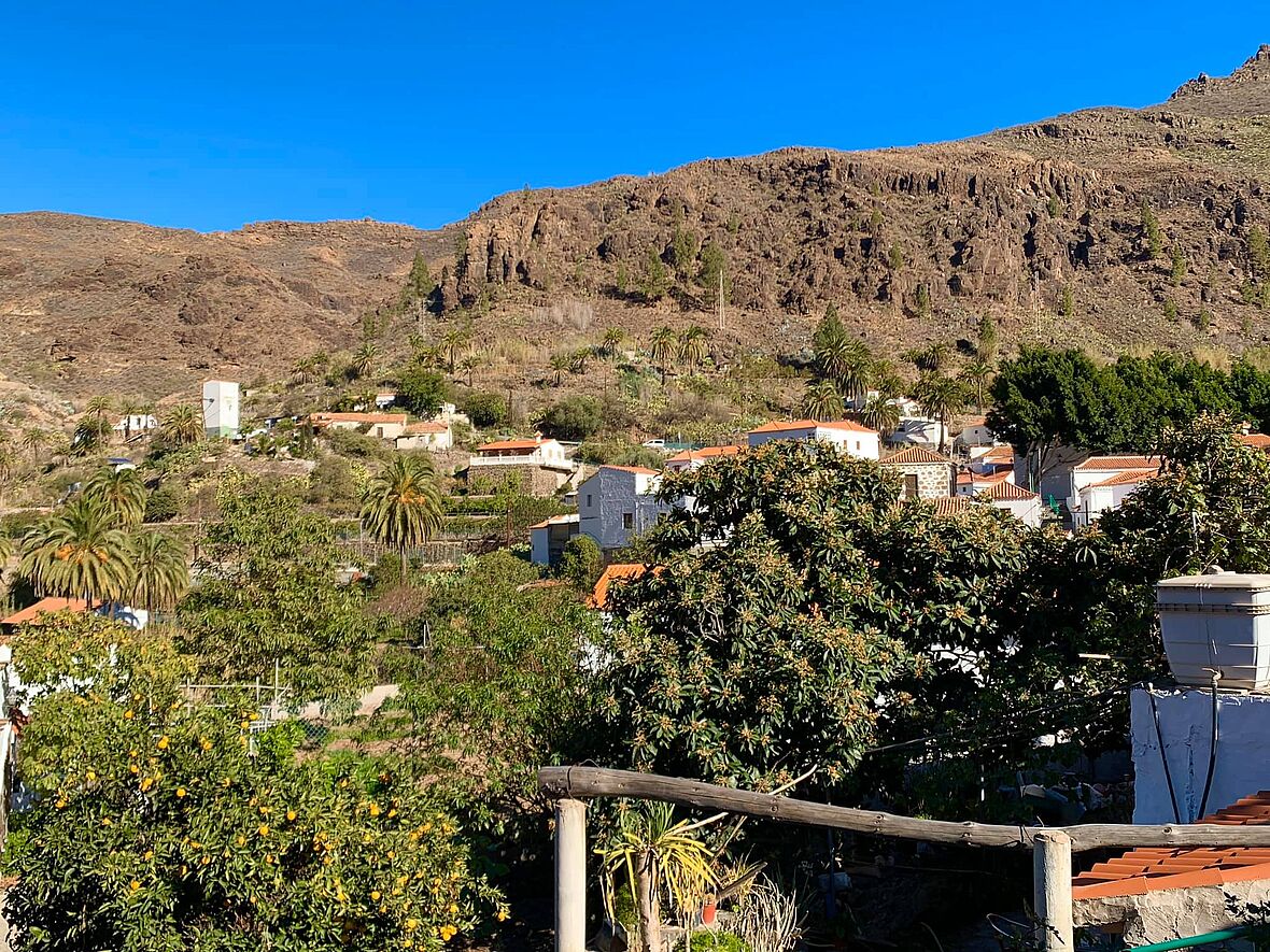 [Translate to Spanisch:] Blick auf Landschaft und Häuser Gran Canaria